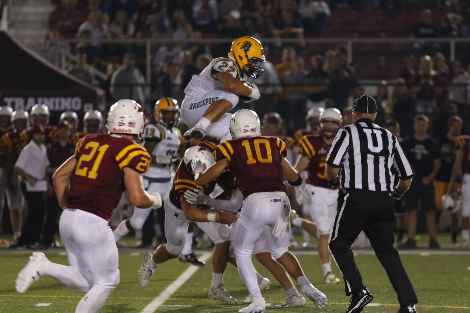 RB going up and over the defense