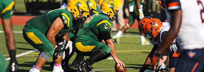 Brockport Golden Eagles OL setting the play