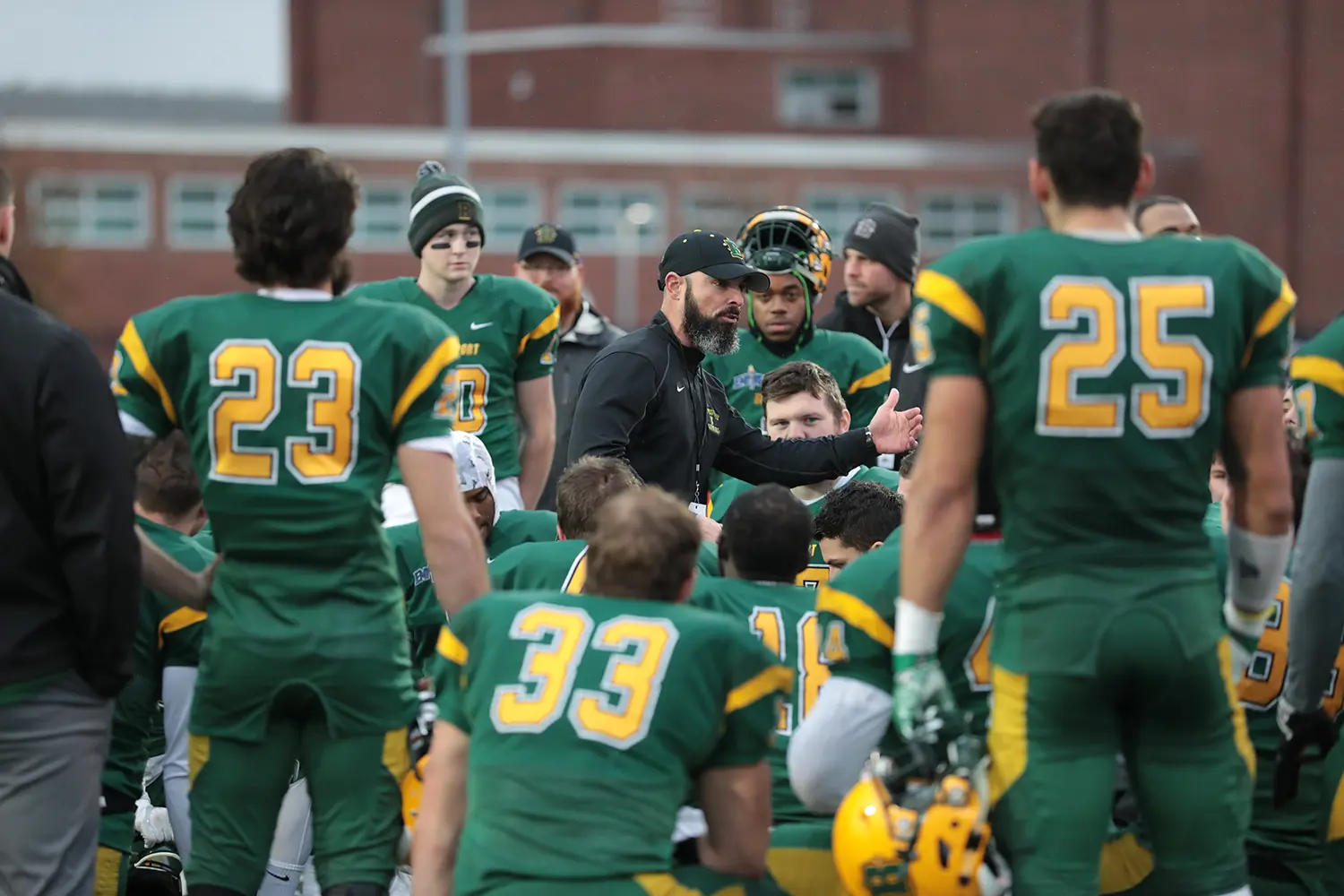 Coach Mangone talking to the team after the win