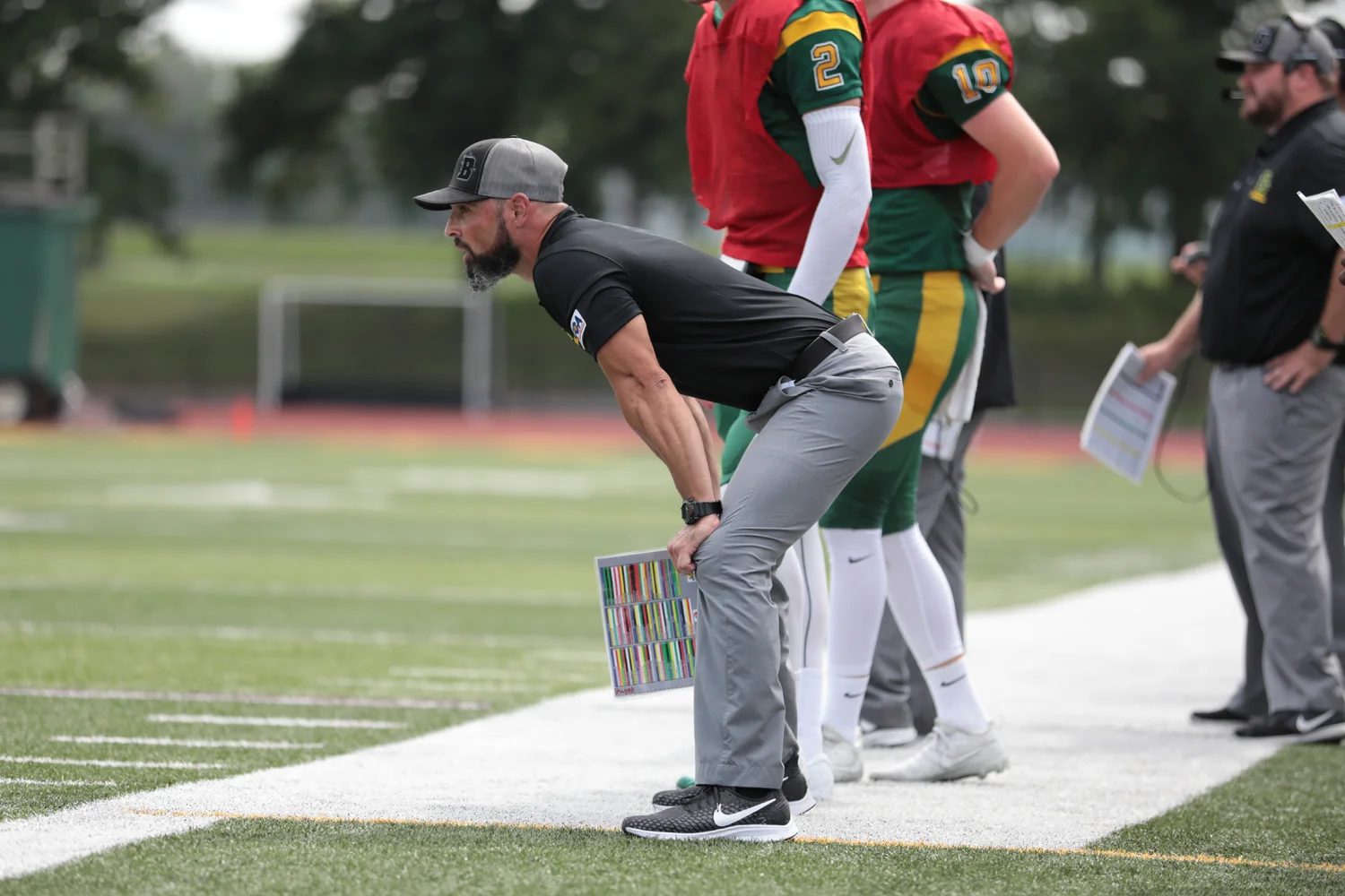Coach Mangone watching his team against Hobart