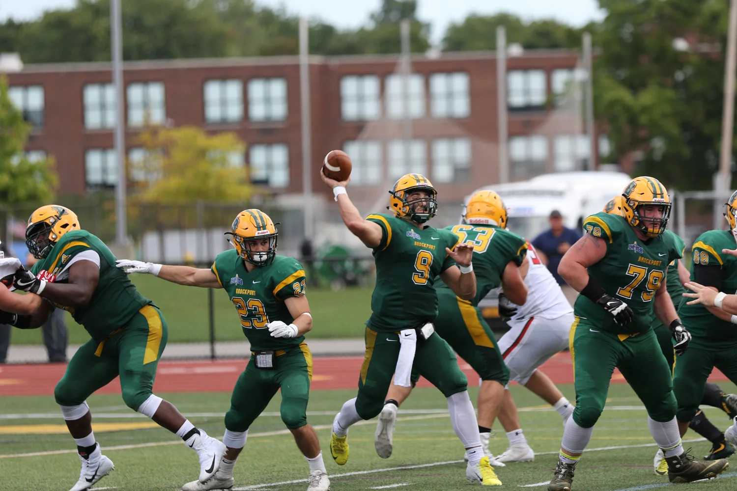 Brockport QB in the pocket throwing the ball down the field