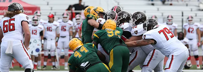 Brockport Golden Eagles defense making the stop