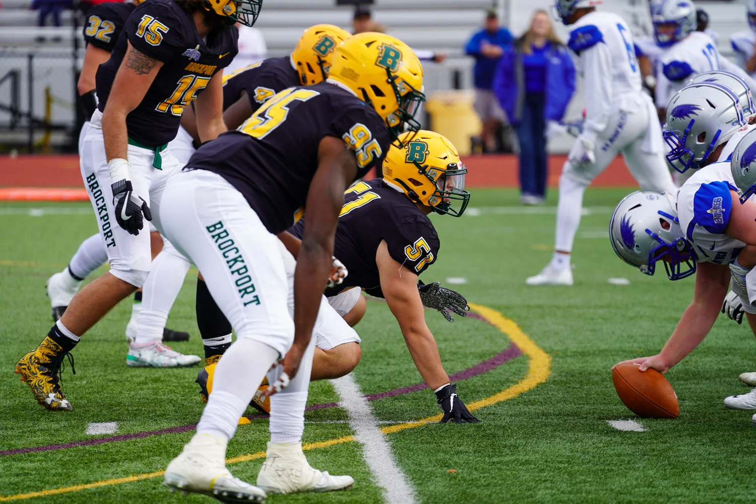 Brockport defensive line set and ready for the play