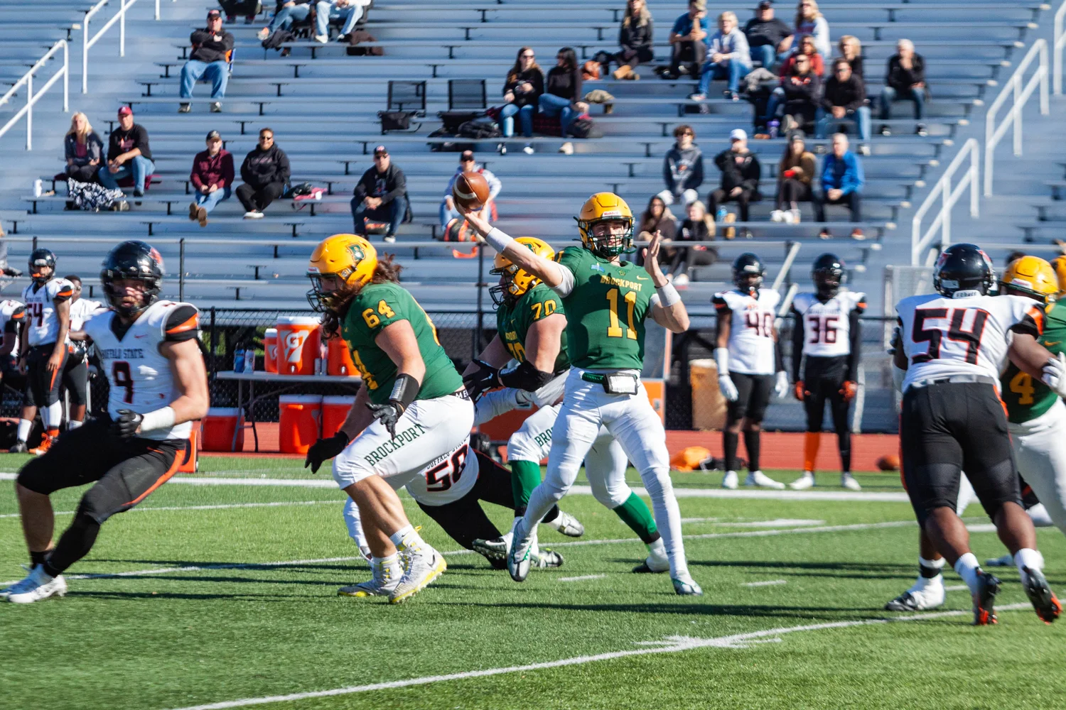 QB throwing the ball against Buffalo State