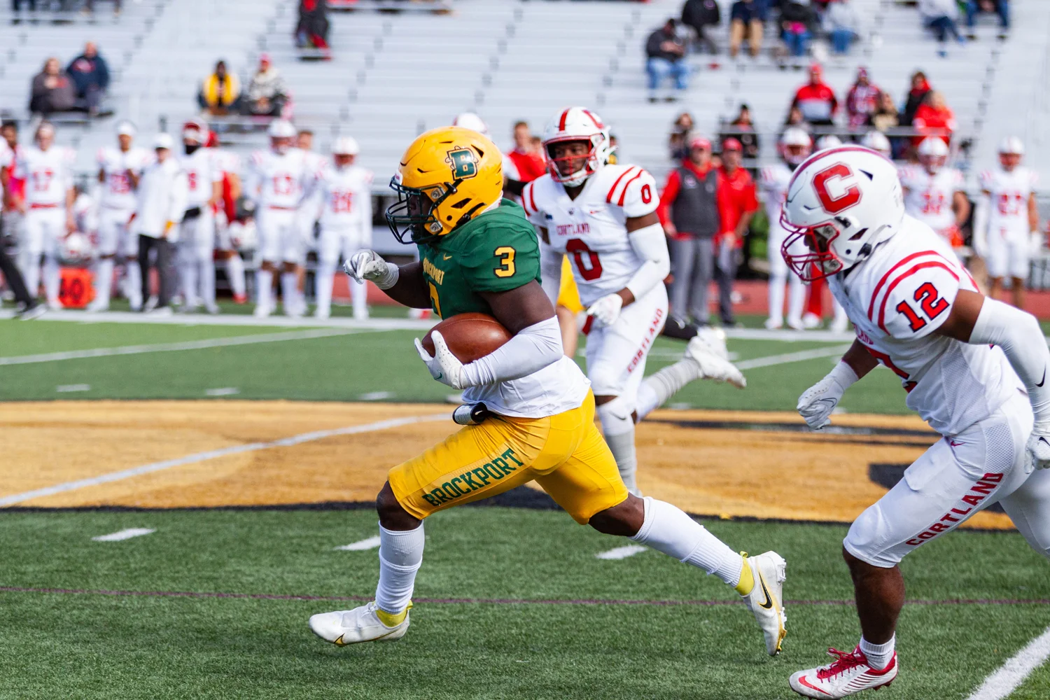 RB running down the field against Cortland