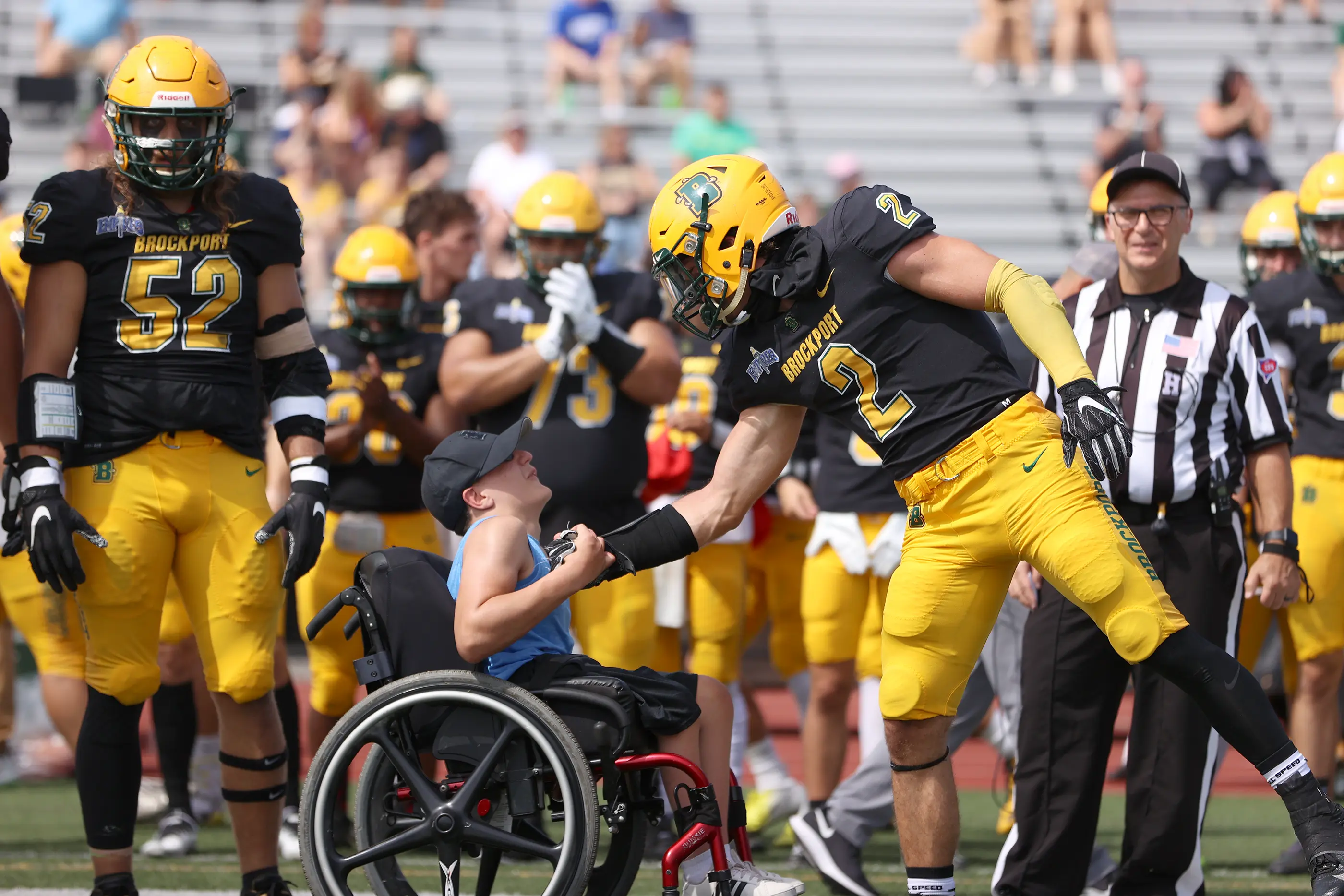 Brockport Football LB meeting Jay at midfield
