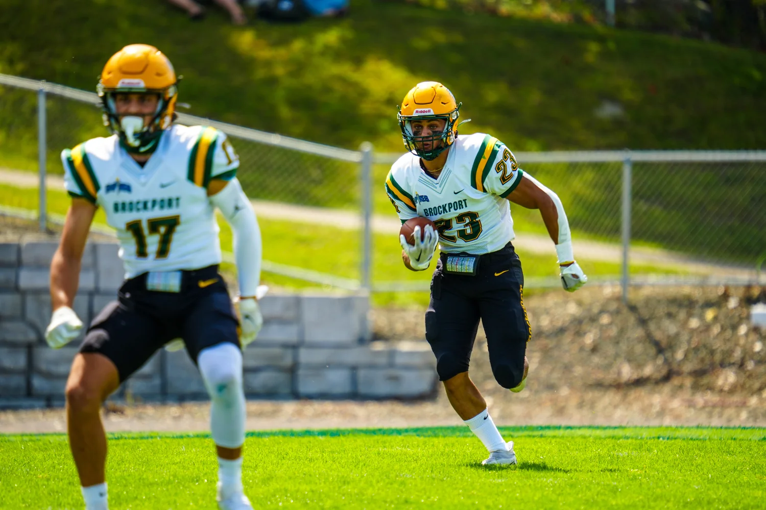 RB bringing the ball out on the kickoff