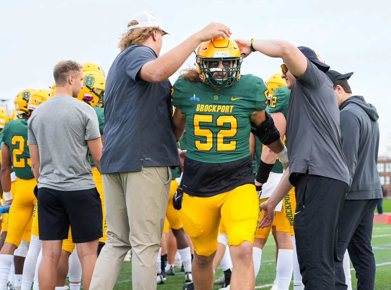 Damiani going by his teammates on Senior Day