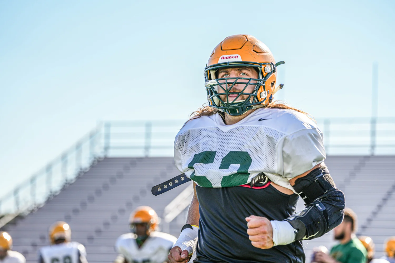 LB warming up for practice
