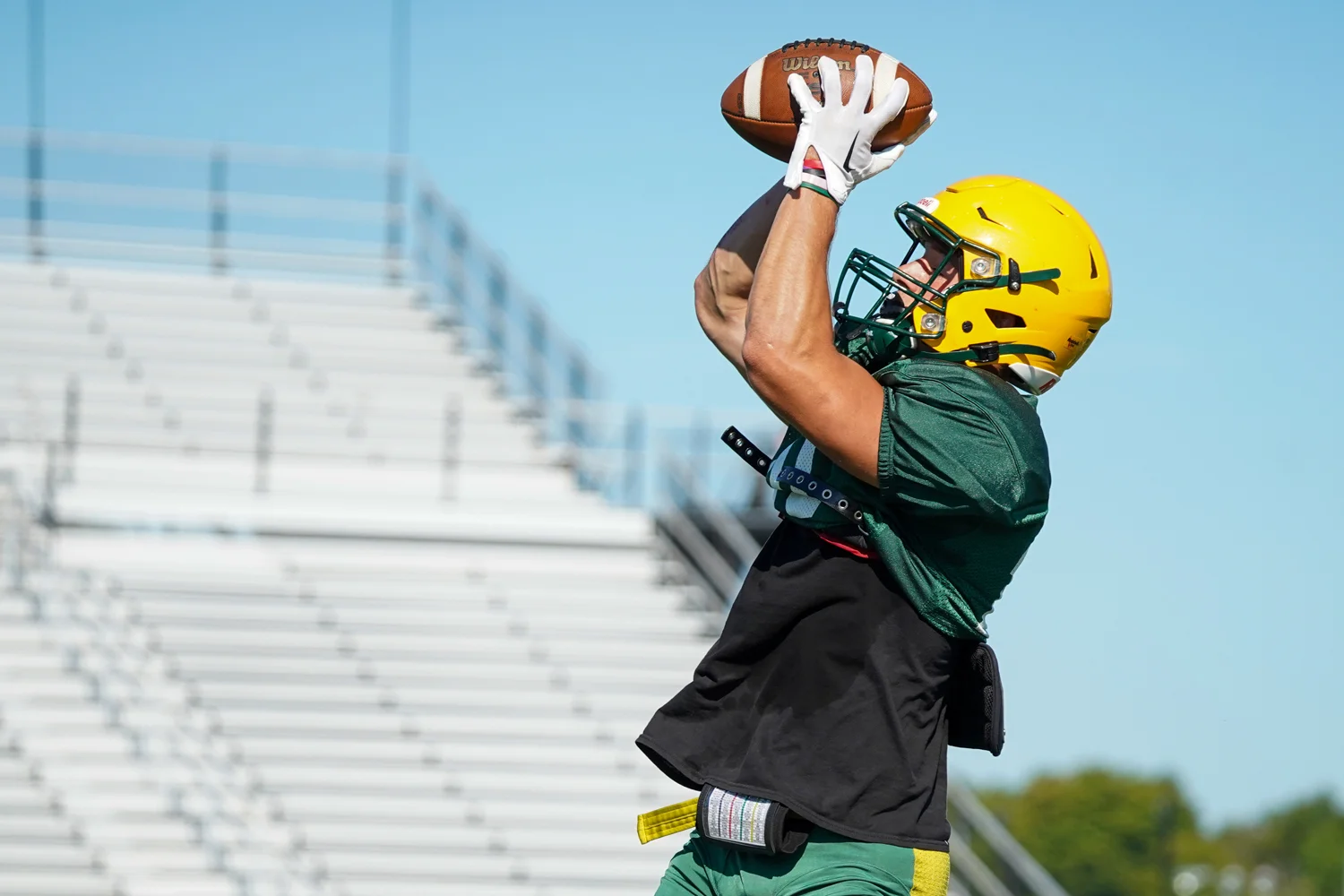 WR catching the ball during practice
