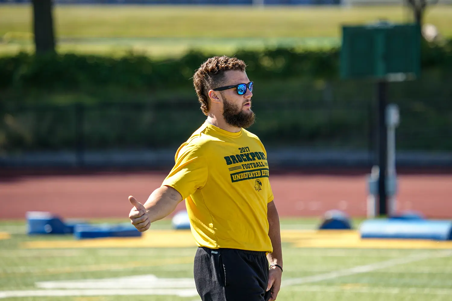 Coach talking to his team about what he is expecting of them
