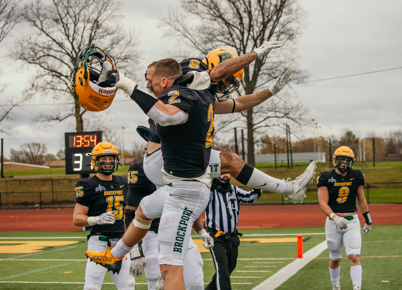 Brockport players celebrating after the TD