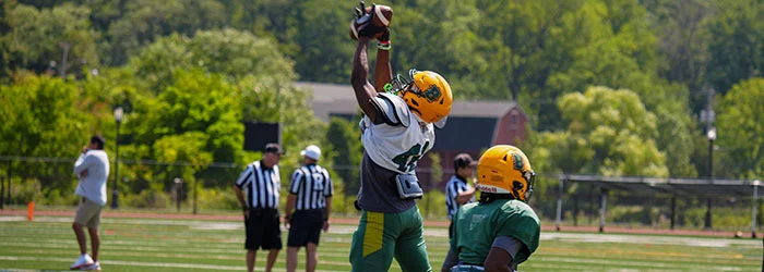 Brockport WR going up for the ball