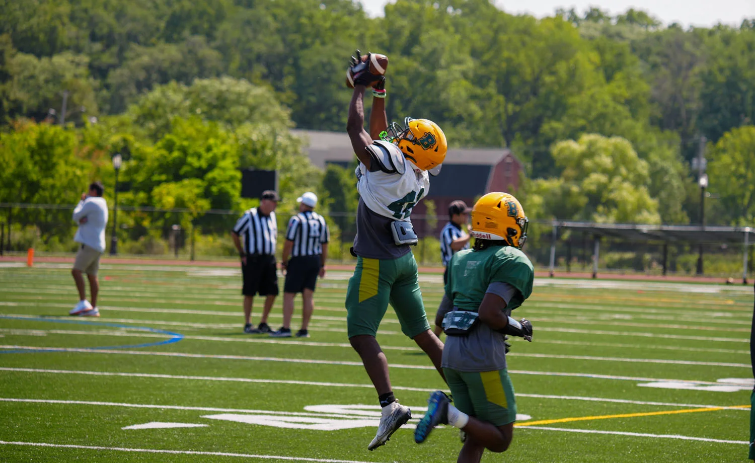 Brockport WR going up for the catch