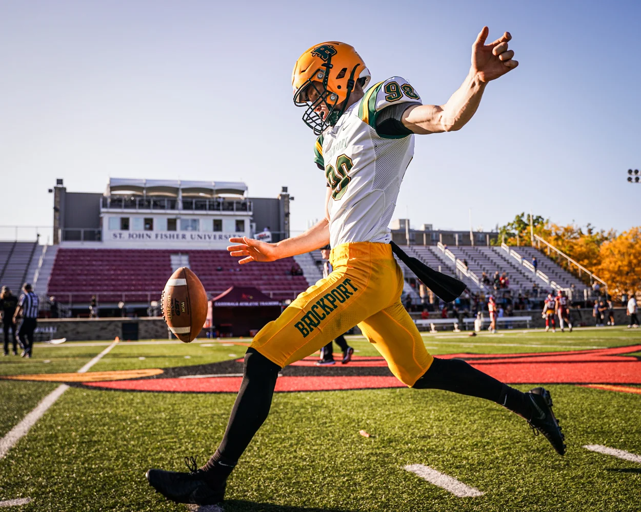 Brockport Punter getting warming up for the game
