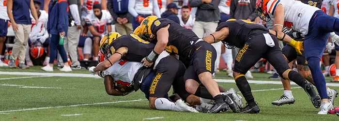 Brockport defense making the tackle