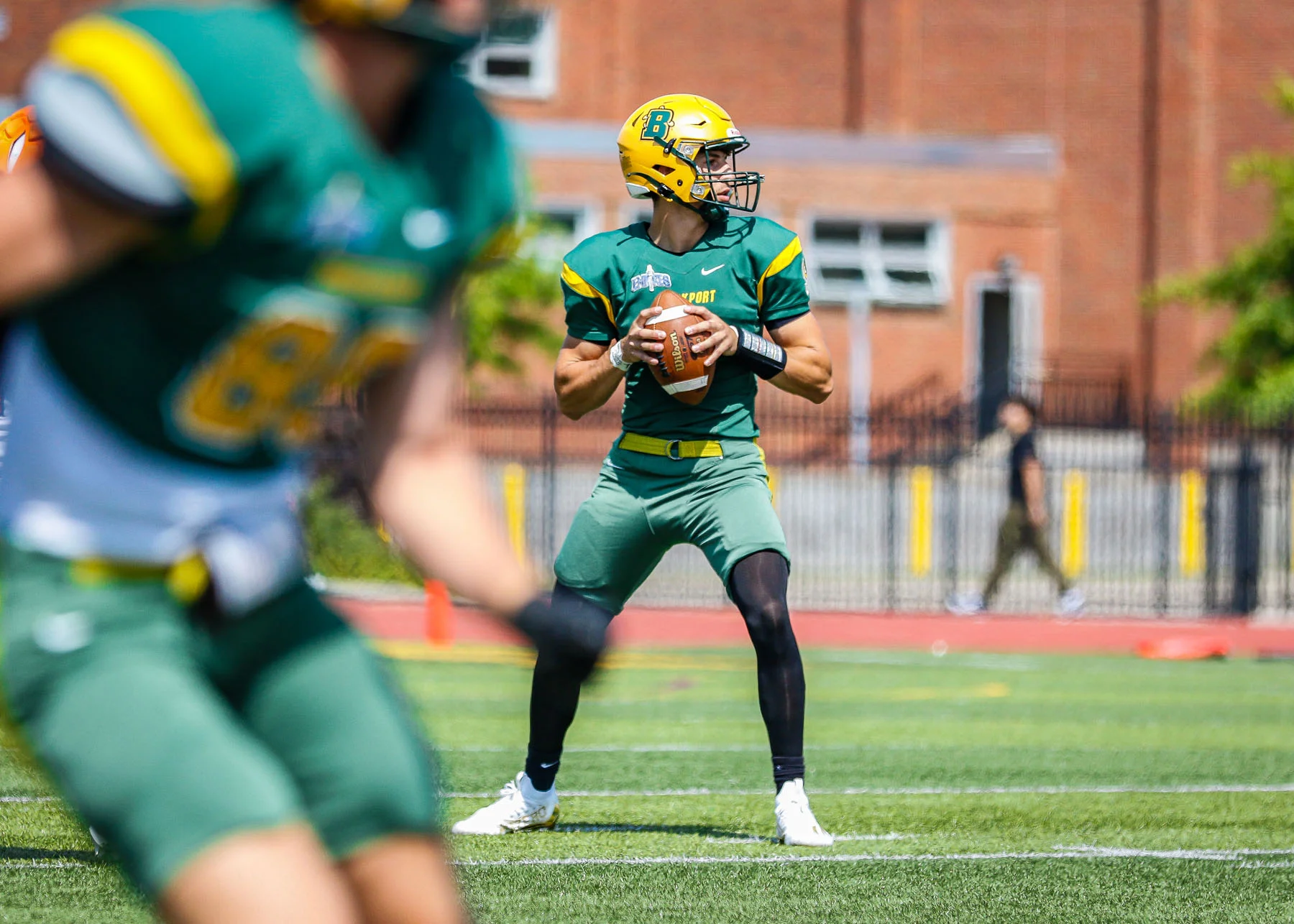 Brockport QB looking to pass the ball