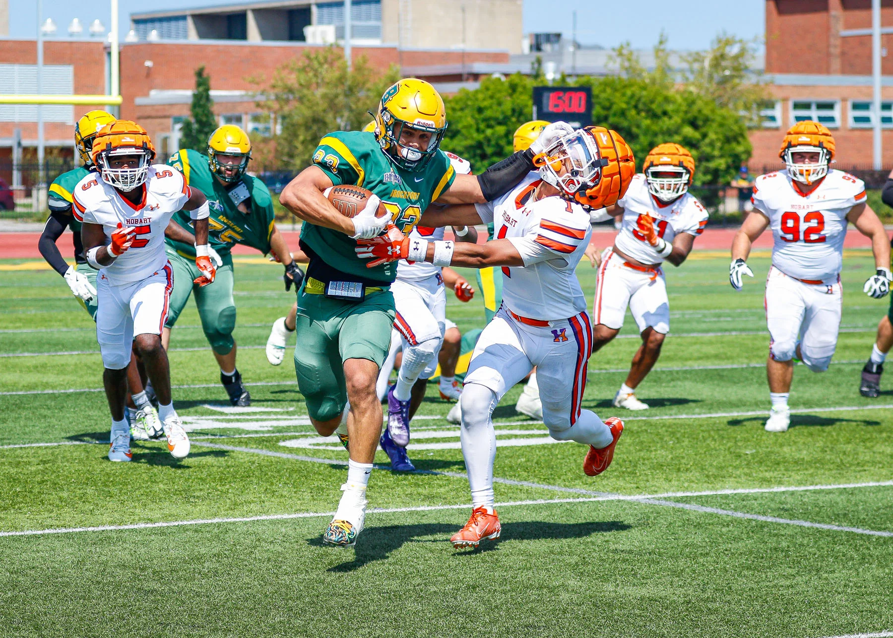 Brockport RB stiff arming the DB