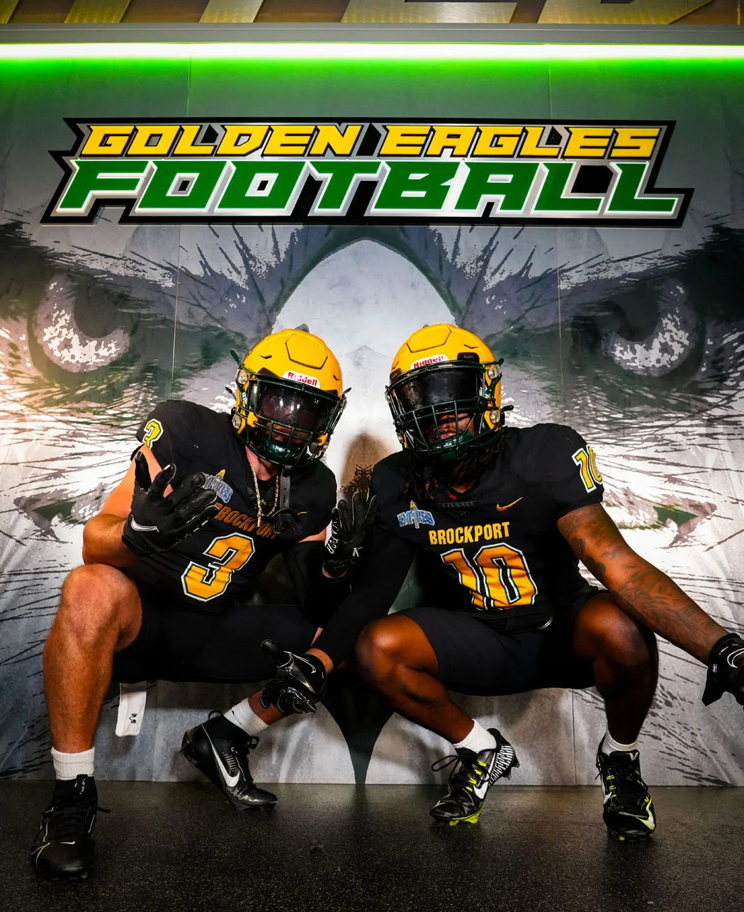 Brockport players in front of Golden Eagles Football