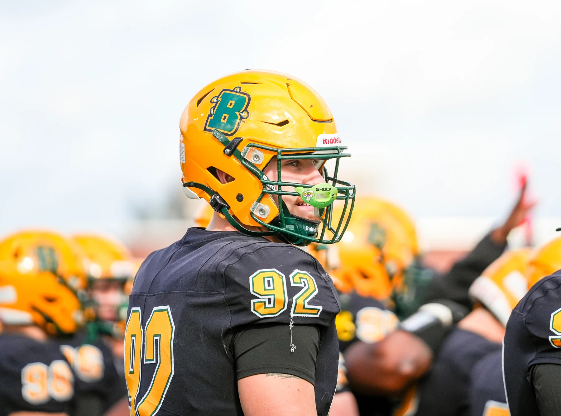 Brockport player on the sidelines