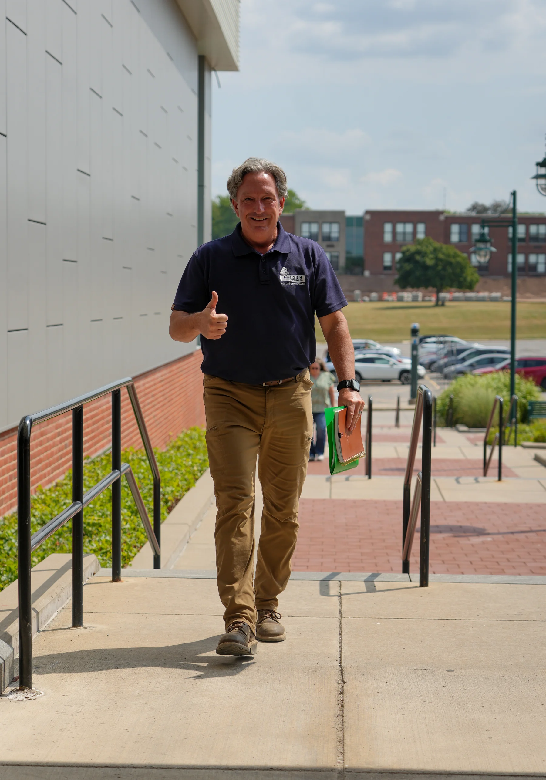 Brockport Coach thumbs up on Check In Day