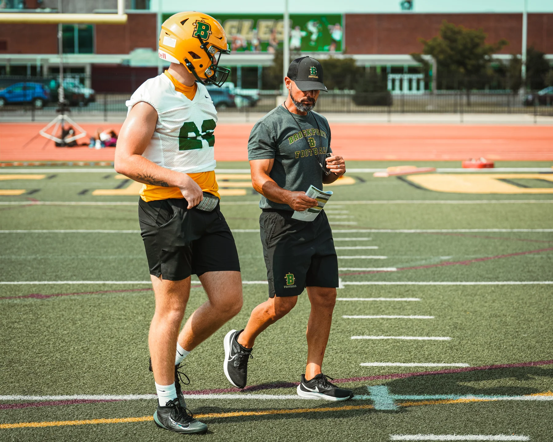 Coach talking to a player on Day 2