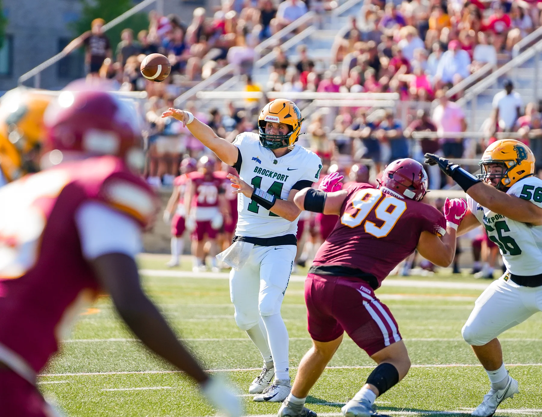 QB throwing the ball to a teammate
