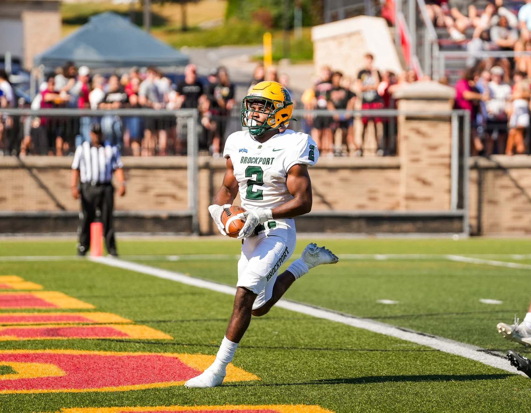 RB crossing into the endzone