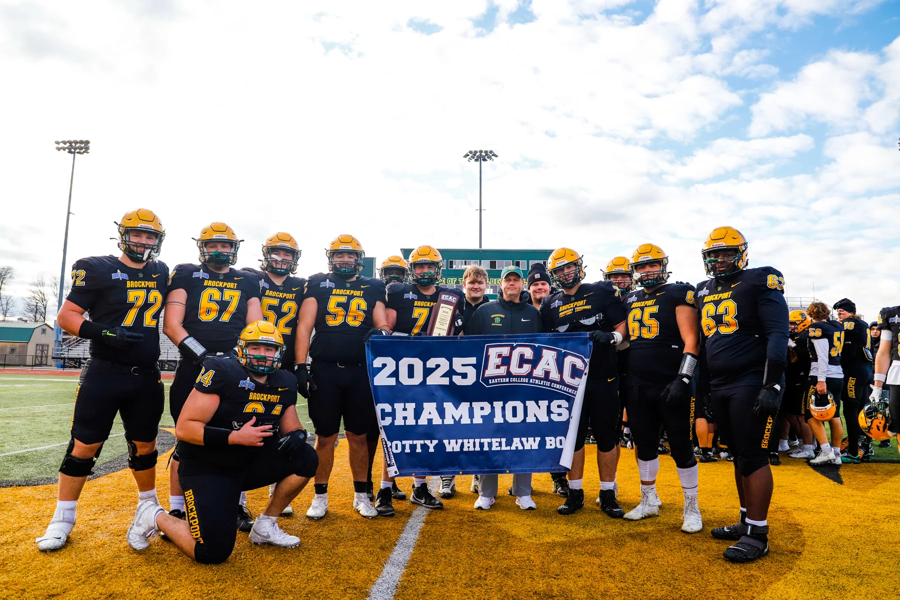 OLineman with the banner after the Win