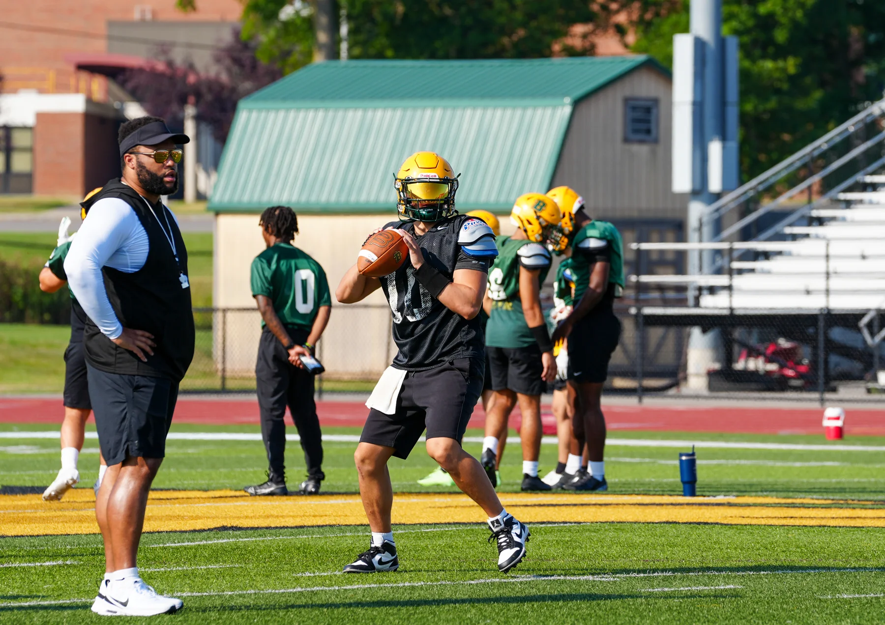 QB looking to pass the ball down field for Brockport