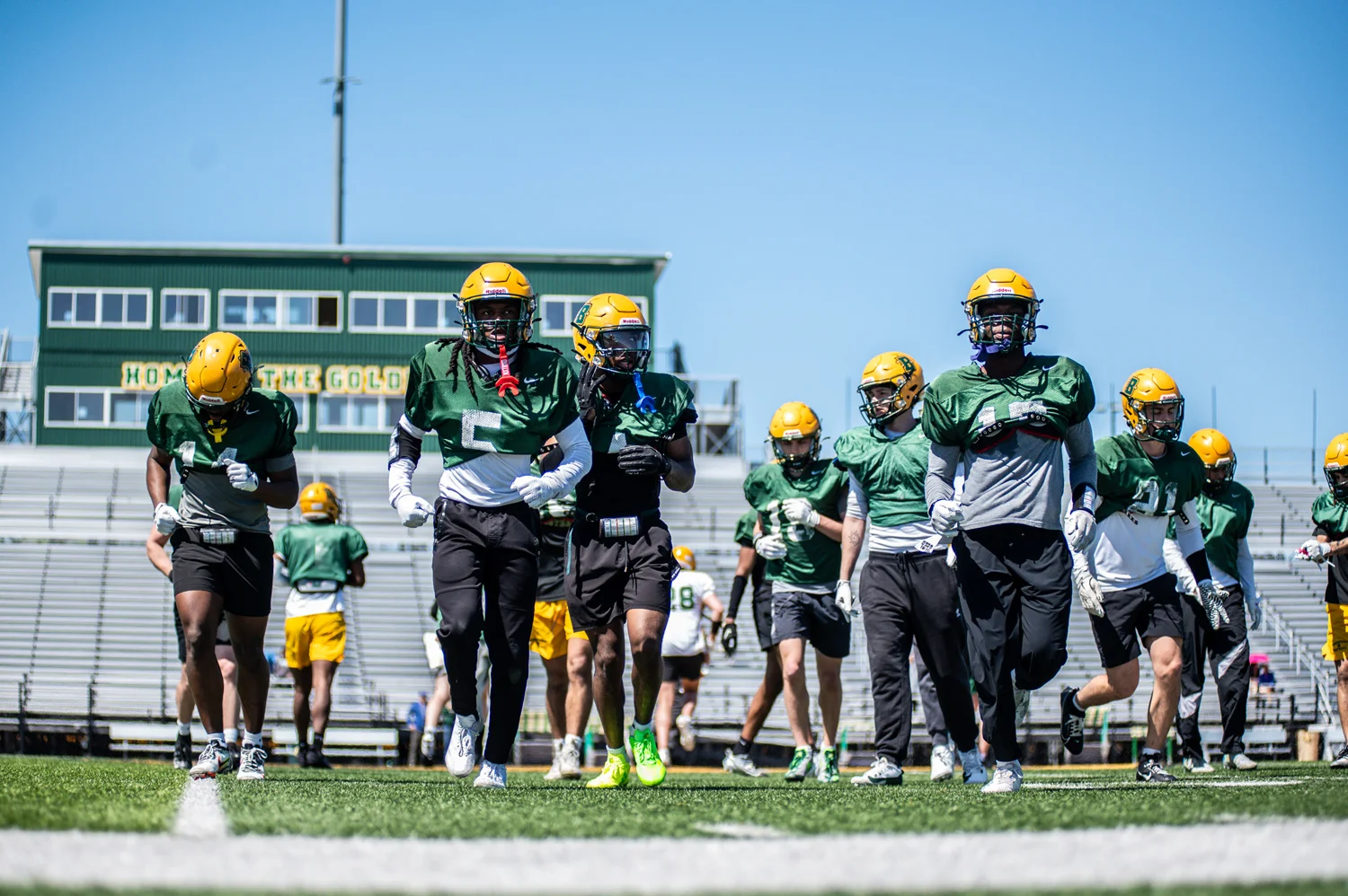 Brockport Football players headed to the sidelines