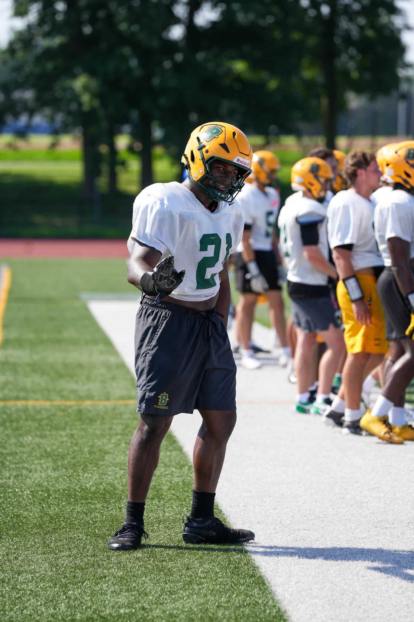 Brockport player with a big smile during practice