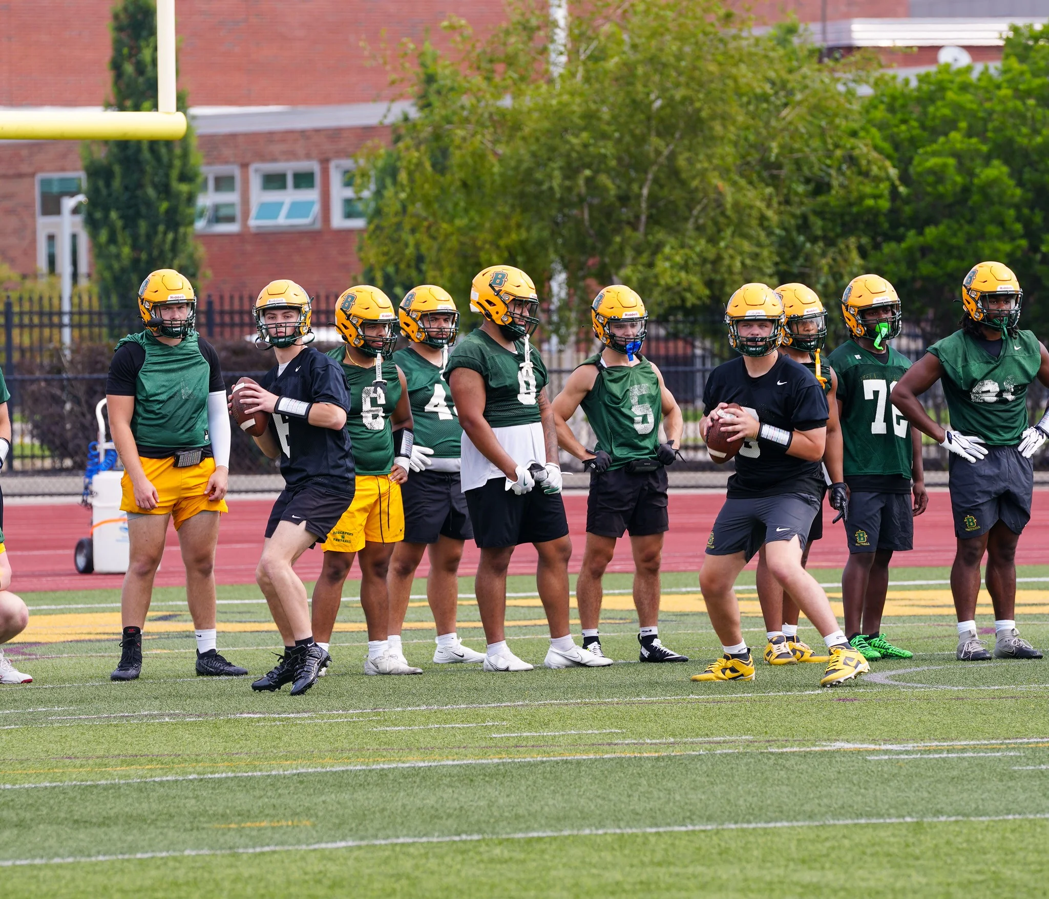 QB's going back to pass looking downfield