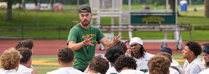Brockport Coach talking to the team