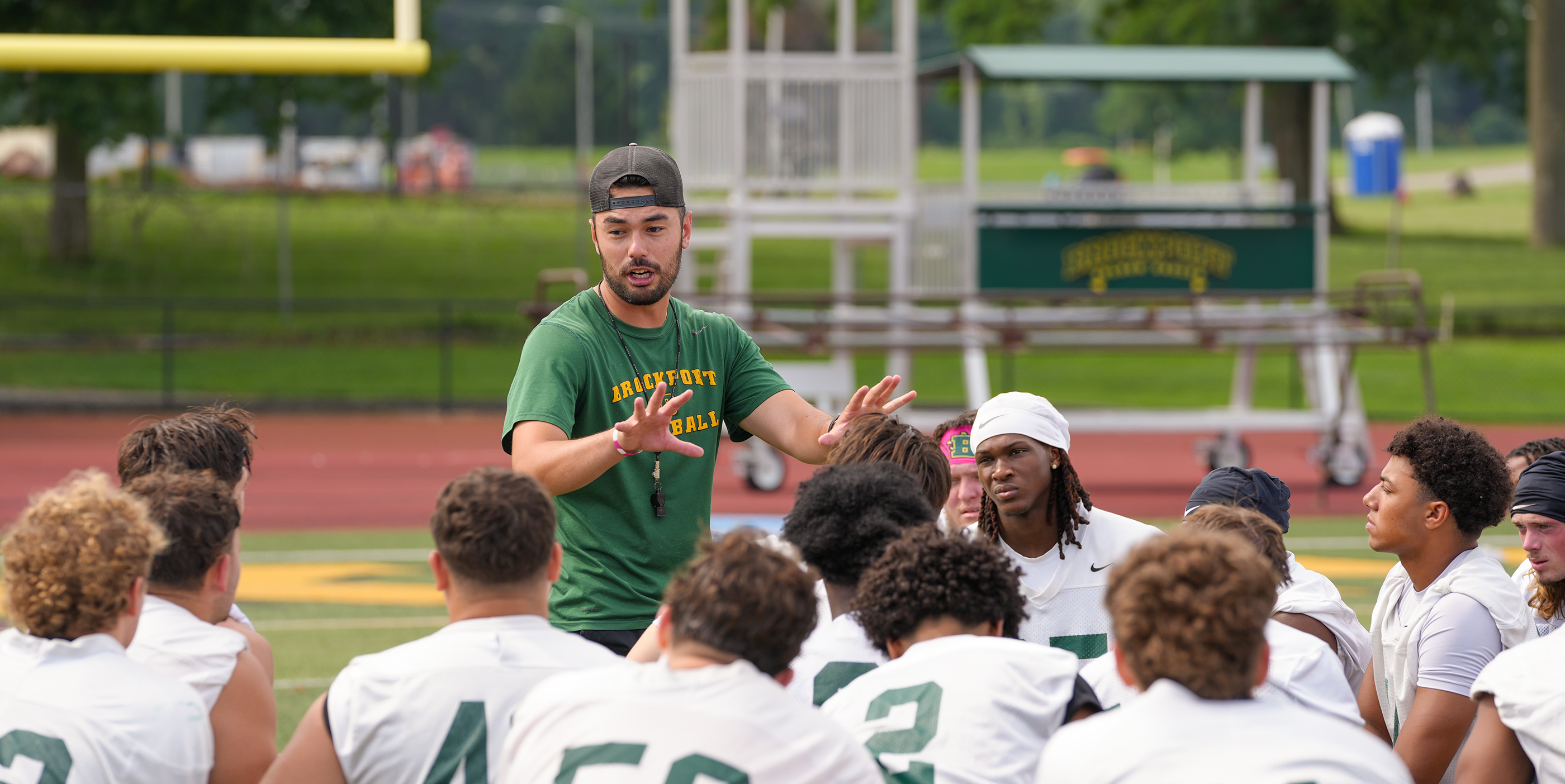 Brockport Football Coach talking to the team